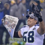 Seattle Seahawks' Breno Giacomini (68) celebrates after the NFL Super Bowl XLVIII football game against the Denver Broncos Sunday, Feb. 2, 2014, in East Rutherford, N.J. The Seahawks won 43-8. (AP Photo/Bill Kostroun)