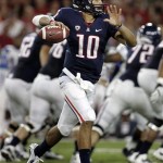 Arizona's starting quarterback Matt Scott (10) scrambles out of the pocket as he looks to pass on the run against South Carolina State during the first half of an NCAA college football game at Arizona Stadium in Tucson, Ariz., Saturday, Sept. 15, 2012. (AP Photo/John Miller)
