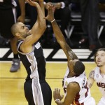 San Antonio Spurs point guard Tony Parker shoots against Miami Heat point guard Mario Chalmers (15) during the first half of Game 6 of the NBA Finals basketball game, Tuesday, June 18, 2013 in Miami. (AP Photo/Wilfredo Lee)