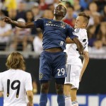 Los Angeles Galaxy forward Gyasi Zardes (29) and Real Madrid forward Joselu, right, goes up for a header during the second half of the International Champions Cup soccer match, Thursday, Aug. 1, 2013, in Glendale, Ariz. Real Madrid won 3-1. (AP Photo/Matt York)