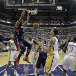 Atlanta Hawks' Al Horford (15) dunks during the first half of Game 1 in the first round of the NBA basketball playoffs against the Indiana Pacers, Sunday, April 21, 2013, in Indianapolis. (AP Photo/Darron Cummings)