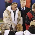 Joe Namath, left, and Phil Simms stand at mid field for the coin toss before the NFL Super Bowl XLVIII football game between the Denver Broncos and the Seattle Seahawks, Sunday, Feb. 2, 2014, in East Rutherford, N.J. (AP Photo/Gregory Bull)