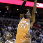 Phoenix Suns' Hakim Warrick, right, shoots as he is fouled by Golden State Warriors' Reggie Williams during the first half of an NBA basketball game Thursday, Dec. 2, 2010, in Oakland, Calif. (AP Photo/Ben Margot)