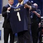 D.J. Fluker, from Alabama, stands with NFL Commissioner Roger Goodell after being selected 11th overall by the San Diego Chargers in the first round of the NFL football draft, Tuesday, April 23, 2013, at Radio City Music Hall in New York. (AP Photo/Gregory Payan)