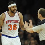 New York Knicks' Rasheed Wallace, left, argues with referee John Goble after being given a technical foul in the first quarter of the NBA basketball game against the Phoenix Suns in New York, Sunday, Dec. 2, 2012. Wallace was given a second technical and ejected from the game. (AP Photo/Henny Ray Abrams)
