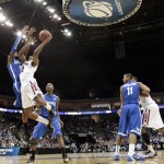 Arizona guard Jordin Mayes shoots against Memphis guard Will Barton in the second half of a West Regional NCAA tournament second-round college basketball game, Friday, March 18, 2011, in Tulsa, Okla. Arizona won 77-75. (AP Photo/Charlie Riedel)