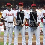 From left Arizona Diamondbacks' Gold Glove winner Gerardo Parra, hitting coach Don Baylor, silver bat winners Daniel Hudson and Justin Upton and National League Manager of the Year Kirk Gibson stand for a picture after receiving their awards prior to an opening day baseball game against the San Francisco Giants, Friday, April 6, 2012, in Phoenix. (AP Photo/Matt York)