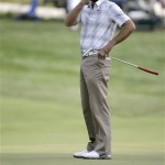 Charl Schwartzel, of South Africa, reacts to missed putt on the 12th hole during the third round of the U.S. Open golf tournament at Merion Golf Club, Saturday, June 15, 2013, in Ardmore, Pa. (AP Photo/Morry Gash)
