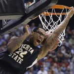 Wichita State's Carl Hall (22) dunks the ball in the first half during a third-round game against Gonzaga in the NCAA men's college basketball tournament in Salt Lake City Saturday, March 23, 2013. (AP Photo/Rick Bowmer)
