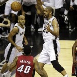 San Antonio Spurs' Tim Duncan (21) dunks during the first half at Game 3 of the NBA Finals basketball series against the Miami Heat, Tuesday, June 11, 2013, in San Antonio. (AP Photo/David J. Phillip)