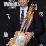 Montreal Canadiens' Max Pacioretty poses with the Bill Masterton Memorial Trophy awarded to the player who best exemplifies perseverance and sportsmanship, during the NHL Awards, Wednesday, June 20, 2012, in Las Vegas. (AP Photo/Julie Jacobson)