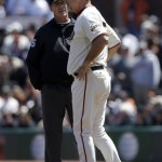 San Francisco Giants manager Bruce Bochy, right, argues with umpire Angel Hernandez after a ball hit by Giants' Guillermo Quiroz was ruled foul during the third inning of a baseball game against the Arizona Diamondbacks in San Francisco, Wednesday, April 24, 2013. (AP Photo/Jeff Chiu)