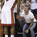David Beckham shakes hands with Miami Heat small forward LeBron James (6) during the second half of Game 7 in their NBA basketball Eastern Conference finals playoff series against the Indiana Pacers, Monday, June 3, 2013 in Miami. The Heat won 99-76. (AP Photo/Lynne Sladky)