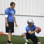 Detroit Lions placekicker Havard Rugland, left, of Norway, and Sam Martin practice ball placement during the NFL football rookie minicamp in Allen Park, Mich., Saturday, May 11, 2013. Rugland, whose trick-shot video turned him into an Internet sensation, is all business now. The Lions signed him a month ago, and now his focus is on adapting to a new sport and trying to make the team. (AP Photo/Carlos Osorio)

