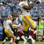 Washington Redskins tight end Fred Davis catches a 3-yard touchdown pass against the Tennessee Titans in the first quarter of a preseason NFL football game on Thursday, Aug. 8, 2013, in Nashville, Tenn. (AP Photo/Mark Zaleski)