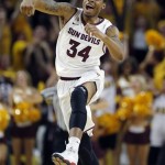  Arizona State guard Jermaine Marshall (34) celebrates as time expires after the second half of an NCAA basketball game against Marquette, Monday, Nov. 25, 2013, in Tempe, Ariz. Arizona State won 79-77. (AP Photo/Matt York)