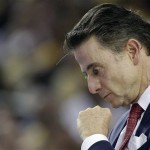 Louisville head coach Rick Pitino walks the court during the first half of a national semifinal at the Final Four of the NCAA college basketball game against Wichita State, Saturday, April 6, 2013, in Atlanta. (AP Photo/David J. Phillip)
