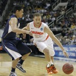 Syracuse guard Brandon Triche (20) drives against California guard Brandon Smith (12) during the first half of a third-round game in the NCAA college basketball tournament Saturday, March 23, 2013, in San Jose, Calif. (AP Photo/Tony Avelar)
