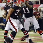 Atlanta Falcons running back Michael Turner (33) celebrates with wide receivers Julio Jones (11) and Roddy White after scoring a touchdown against the New Orleans Saints during the first half of an NFL football game, Thursday, Nov. 29, 2012, in Atlanta. (AP Photo/Rich Addicks)
