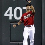 Arizona Diamondbacks' Chris Young catches a fly 
out hit by Seattle Mariners' Michael Saunders 
during the third inning of an interleague 
baseball game, Wednesday, June 20, 2012, in 
Phoenix. (AP Photo/Matt York)