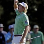 Brandt Snedeker reacts after making a birdie putt on the 15th hole during the third round of the Masters golf tournament Saturday, April 13, 2013, in Augusta, Ga. (AP Photo/Darron Cummings)
