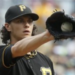 Pittsburgh Pirates starting pitcher Jeff Locke gets a new ball during the first inning against the Arizona Diamondbacks in a baseball game Saturday, Aug. 17, 2013, in Pittsburgh. (AP Photo/Keith Srakocic)