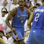 Oklahoma City Thunder's Serge Ibaka (9) reacts after making a basket against the Houston Rockets during the closing minutes of the fourth quarter of Game 3 in a first-round NBA basketball playoff series Saturday, April 27, 2013, in Houston. The Thunder beat the Rockets 104-101. (AP Photo/David J. Phillip)