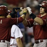 Arizona Diamondbacks' Paul Goldschmidt, right, is congratulated by teammate Gerardo Parra after hitting a grand slam during the seventh inning of a baseball game against the St. Louis Cardinals, Wednesday, June 5, 2013, in St. Louis. (AP Photo/Jeff Roberson)