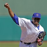 Chicago Cubs starting pitcher Edwin Jackson throws before the first inning of an exhibition spring training baseball game against the Colorado Rockies, Tuesday, Feb. 26, 2013, in Phoenix. (AP Photo/Morry Gash)