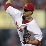 St. Louis Cardinals' Kyle Lohse delivers a pitch in the first inning of a baseball game against the Arizona Diamondbacks, Thursday, Aug. 16, 2012, in St. Louis. (AP Photo/Tom Gannam)