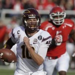 Arizona State quarterback Taylor Kelly (10) carries the ball for a touchdown in the first quarter during an NCAA college football game against Utah on Saturday, Nov. 9, 2013, in Salt Lake City. (AP Photo/Rick Bowmer)
