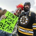 Steve Parankaewich of Regina, Saskatchewan, left, and Luciano Rinaldi of Moosejaw, Saskatchewan, Canada, pose outside TD Garden before Game 4 of the NHL hockey Stanley Cup Finals between the Boston Bruins and the Chicago Blackhawks in Boston, Wednesday, June 19, 2013. (AP Photo/Charles Krupa)