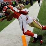 Atlanta Falcons' Julio Jones catches touchdown pass in front of San Francisco 49ers' Tarell Brown during the first half of the NFL football NFC Championship game Sunday, Jan. 20, 2013, in Atlanta. (AP Photo/John Bazemore)