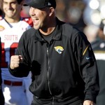 South coach Gus Bradley, of the Jacksonville Jaguars, reacts to a touchdown during the first half of the Senior Bowl NCAA college football game against the North on Saturday, Jan. 25, 2014, in Mobile, Ala. (AP Photo/Butch Dill)