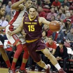  Arizona State's Egor Koulechov, of Russia, drives past UNLV's Khem Birch, of Canada, during the first half of an NCAA college basketball game on Tuesday, Nov. 19, 2013, in Las Vegas. (AP Photo/Isaac Brekken)