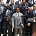 President Barack Obama gestures as he welcomes the Super Bowl XLVII champion Baltimore Ravens football team to the South Lawn of the White House in Washington, Wednesday, June 5, 2013. From left are: retired linebacker Ray Lewis; safety Ed Reed, now with the Houston Texas; running back Ray Rice, team President Richard W. Cass, the president, and head coach John Harbaugh. The Ravens defeated the San Francisco 49ers in Super Bowl XLVII. (AP Photo/Charles Dharapak)