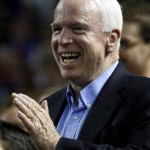 Sen. John McCain, R-Ariz., smiles and cheers on Arizona 
Diamondbacks' Paul Goldschmidt after hitting a home run against the 
Chicago Cubs as he attends the game during the sixth inning in an 
MLB baseball game Saturday, June 23, 2012, in Phoenix. (AP 
Photo/Ross D. Franklin)
