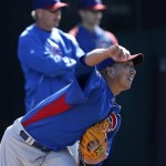 Chicago Cubs' Kyuji Fujikawa, of Japan, throws a pitch during a spring training baseball workout for pitchers and catchers Tuesday, Feb. 12, 2013, in Mesa, Ariz.(AP Photo/Ross D. Franklin)