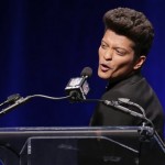 Bruno Mars who will headline the half-time show at the NFL Super Bowl XLVIII football game speaks during a press conference Thursday, Jan. 30, 2014, in New York. (AP Photo/)