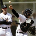 Miami Marlins catcher Rob Brantly throws to first during a spring training baseball workout, Friday, Feb. 22, 2013, in Jupiter, Fla. (AP Photo/Julio Cortez)