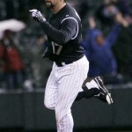 Colorado Rockies' Todd Helton celebrates as he circles the bases after 
hitting a two-run, walkoff home run against the Arizona 
Diamondbacks in the ninth inning of the Rockies' 8-7 victory in a 
baseball game in Denver on Saturday, April 14, 2012. (AP Photo/David 
Zalubowski)
