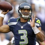Seattle Seahawks quarterback Russell Wilson sets to pass in the first half of an NFL football game against the Green Bay Packers, Monday, Sept. 24, 2012, in Seattle. (AP Photo/Stephen Brashear)