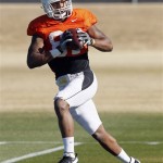 Oklahoma State receiver Tracy Moore makes a catch during practice Tuesday, Dec. 27, 2011, in Scottsdale, Ariz. Oklahoma State will face Stanford in the Fiesta Bowl college football game on Jan. 2. (AP Photo/Matt York)
