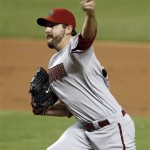 Arizona Diamondbacks starting pitcher Joe Saunders throws in the first inning during a baseball game against the Miami Marlins in Miami, Friday, April 27, 2012. (AP Photo/Lynne Sladky)