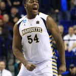 Marquette forward Davante Gardner (54) reacts after teammate Vander Blue scored the game winning basket in the final seconds of a second-round NCAA college basketball tournament game against the Davidson, Thursday, March 21, 2013, in Lexington, Ky. Marquette won 59-58. (AP Photo/James)