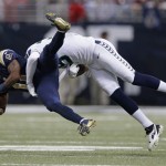 St. Louis Rams wide receiver Tavon Austin (11) gets tackled by Seattle Seahawks cornerback Brandon Browner (39) during the first half of an NFL football game, Monday, Oct. 28, 2013, in St. Louis. (AP Photo/Michael Conroy)