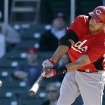 Cincinnati Reds' Donald Lutz drives in two runs with a bases-loaded double against the Arizona Diamondbacks during the sixth inning of an exhibition spring training baseball game, Wednesday, Feb. 27, 2013, in Scottsdale, Ariz. (AP Photo/Marcio Jose Sanchez)