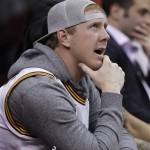 Cleveland Browns quarterback Brandon Weeden watches the Cleveland Cavaliers play the Phoenix Suns in an NBA basketball game Tuesday, Nov. 27, 2012, in Cleveland. The Suns won 91-78. (AP Photo/Tony Dejak)