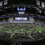 Reporters crowd the floor of the Prudential Center during media day for the NFL Super Bowl XLVIII football game Tuesday, Jan. 28, 2014, in Newark, N.J. (AP Photo/Charlie Riedel)