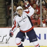 Washington Capitals right wing Alex Ovechkin celebrates his goal during the first period of an NHL hockey game against the Chicago Blackhawks, Tuesday, Oct. 1, 2013, in Chicago. (AP Photo/Nam Y. Huh)
